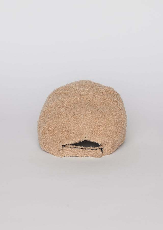 Back of light tan sherpa baseball cap