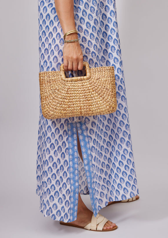 Model holding rectangular shape hyacinth bag