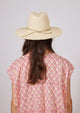 Back of fringed sun hat on model