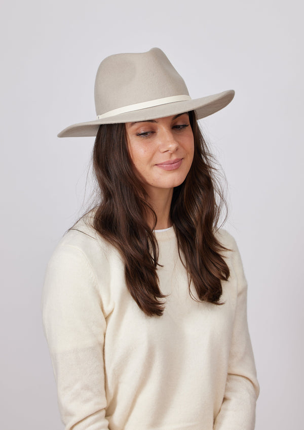 Beige wool felt brimmed hat on model