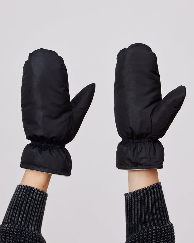 Water resistant black mittens on model