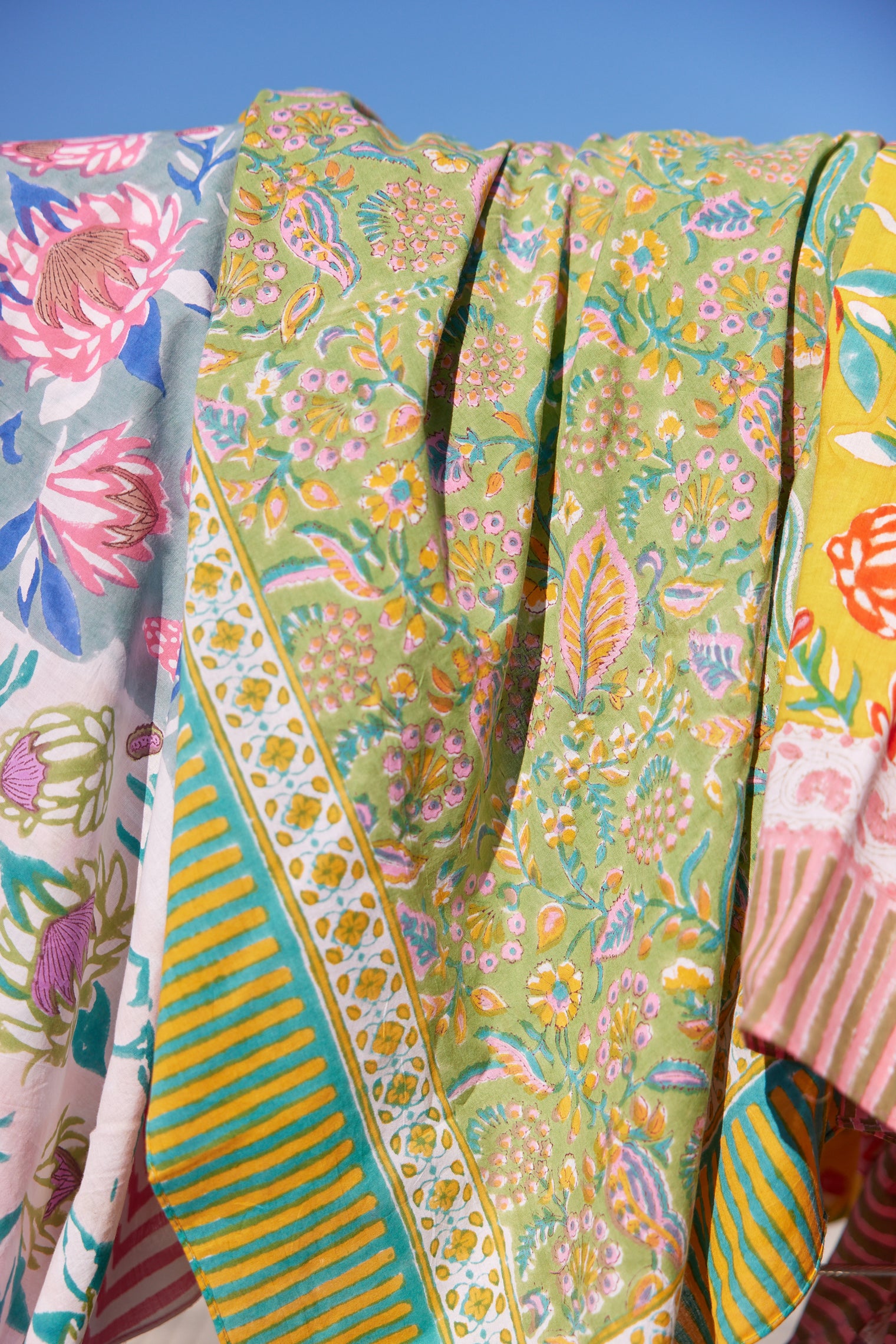 Green floral beach blanket