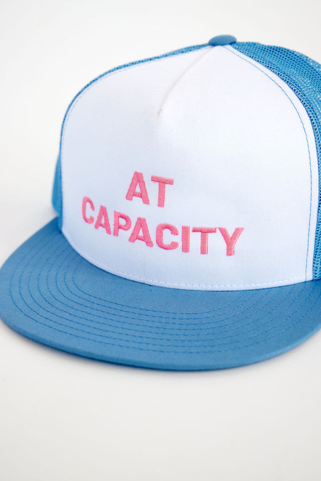 3/4 angle of blue and white novelty baseball cap