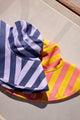 Striped bucket hats on beach chair