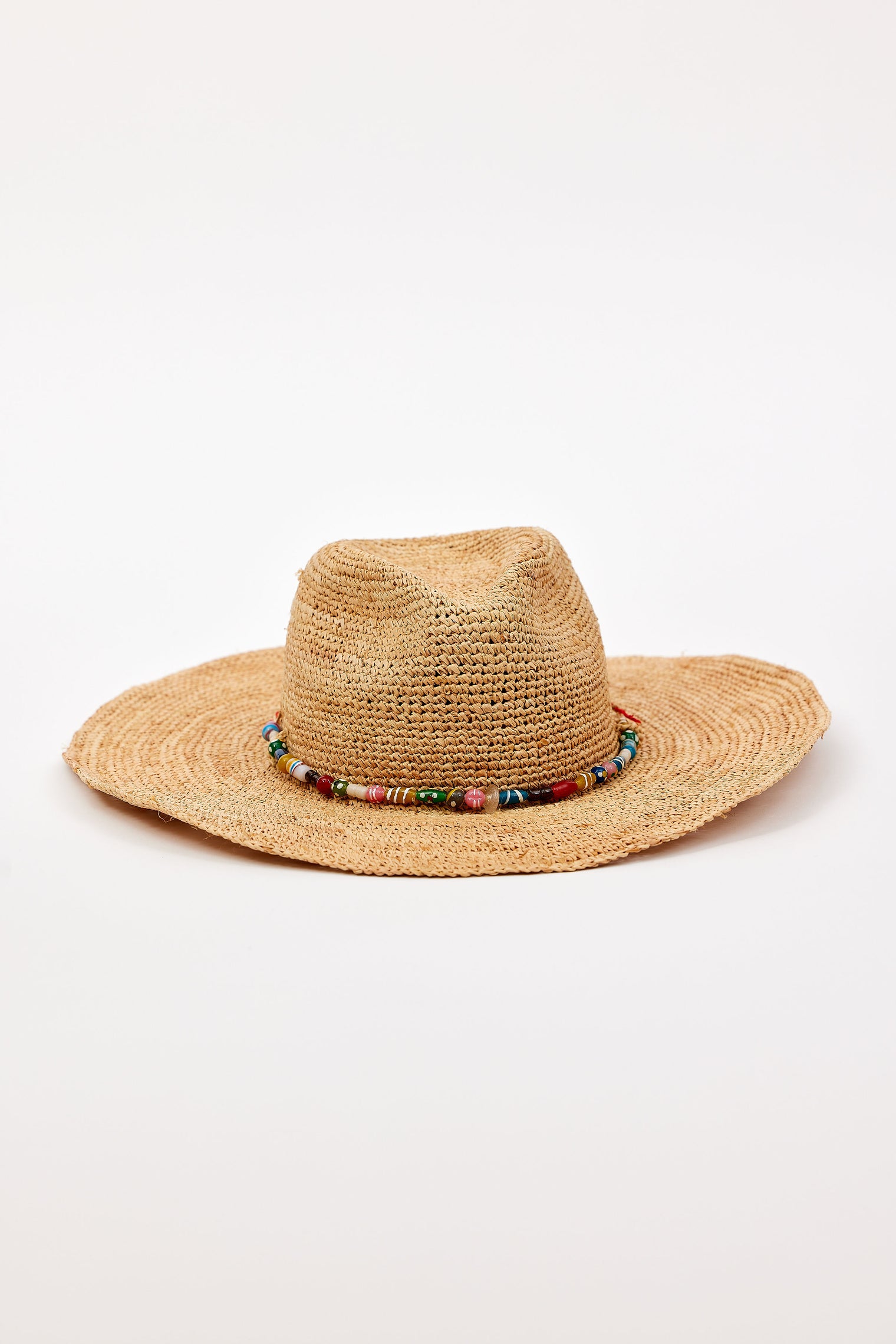 Straw hat with a colorful bead band on a white background