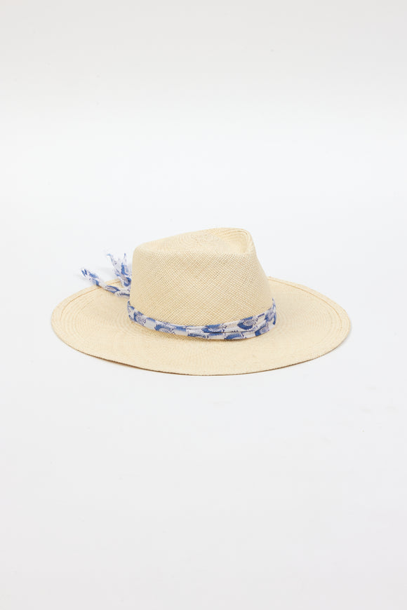 3/4 angle of Panama hat with blue and white fabric trim