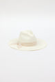 3/4 angle of white panama hat with tan dotted stripe trim
