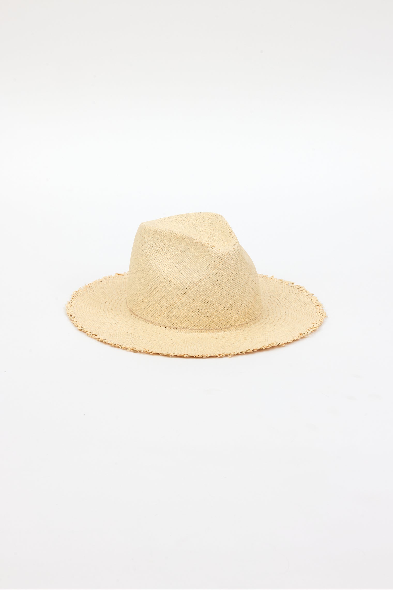3/4 angle of light tan fringed panama hat