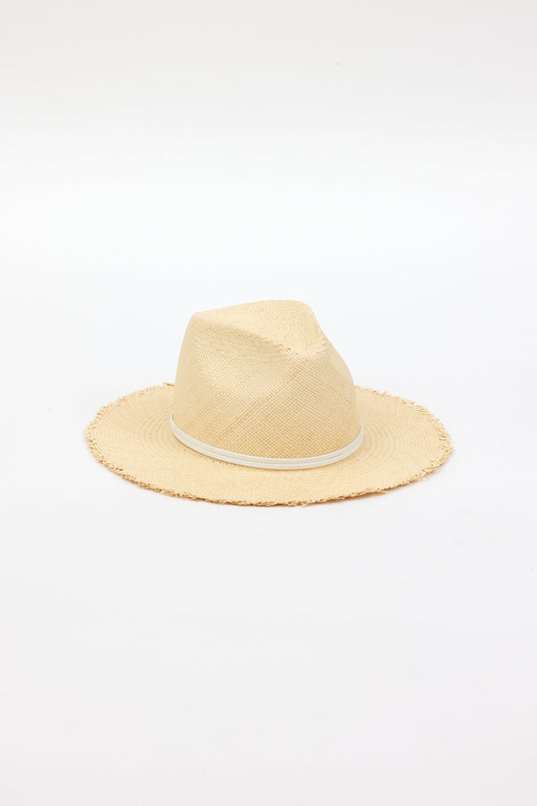 3/4 angle of natural fringed panama hat with white trim
