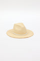 3/4 angle of natural fringed panama hat with white trim