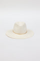 Front angle of white brimmed hat with gold trim