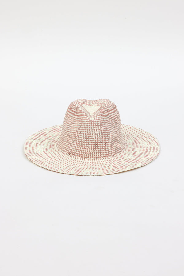 Front angle of pink and natural colored brimmed straw sun hat