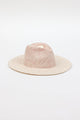 3/4 angle of pink and natural colored brimmed straw sun hat
