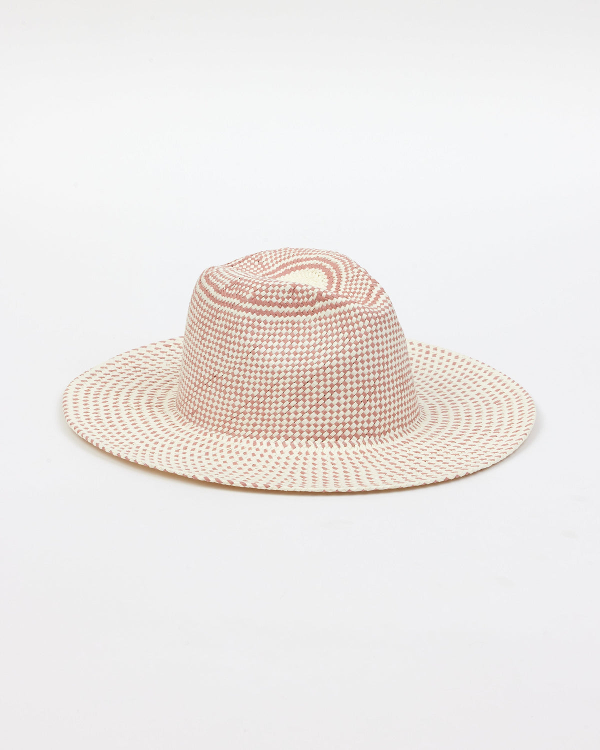3/4 angle of pink and natural colored brimmed straw sun hat