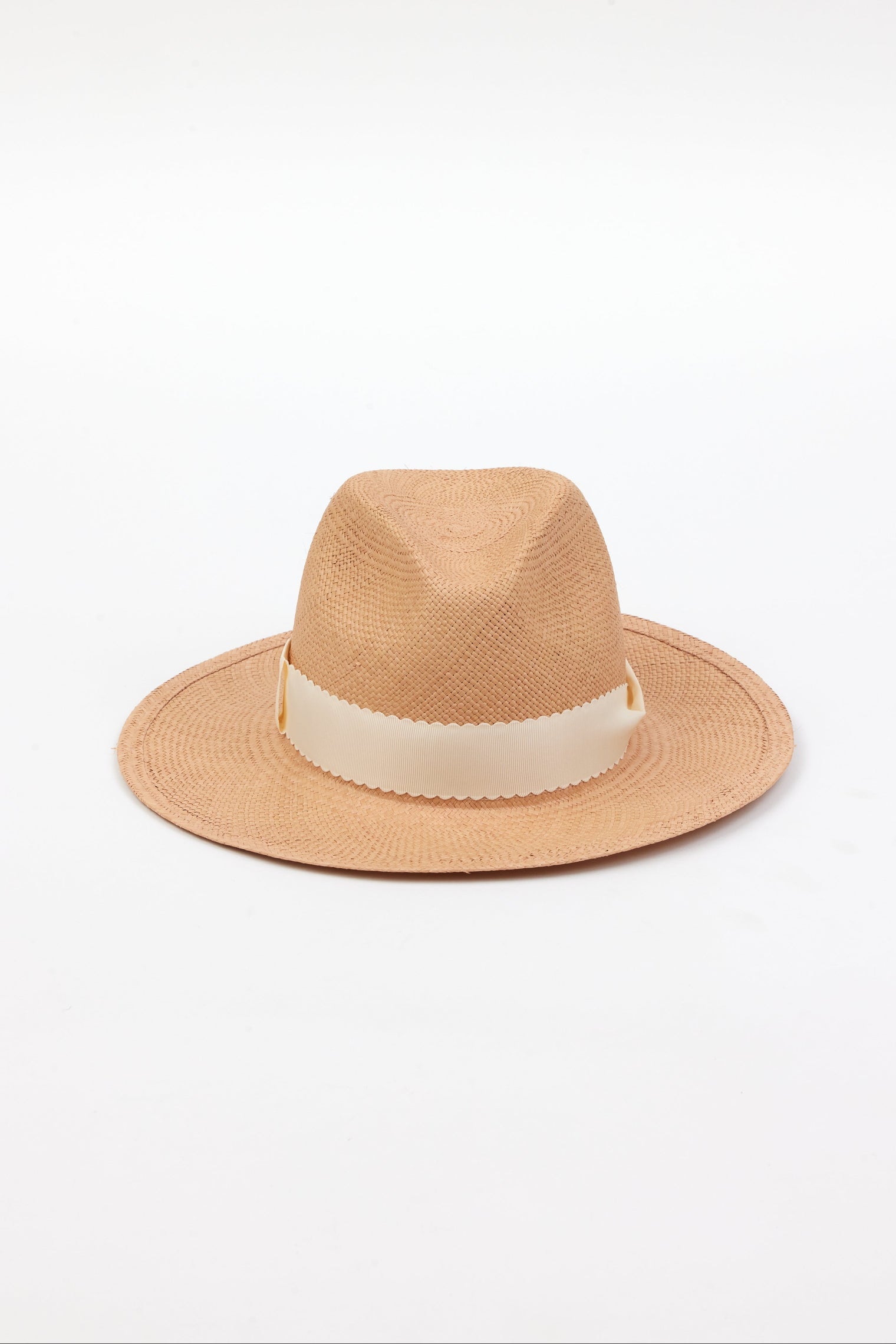 Front angle of pecan brown panama straw hat with ivory ribbon trim