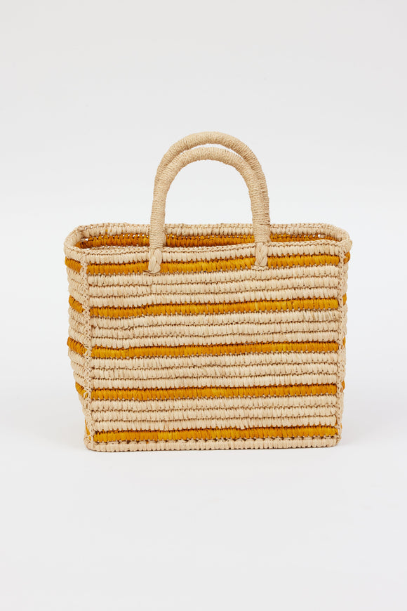 light tan straw bag with brown stripes