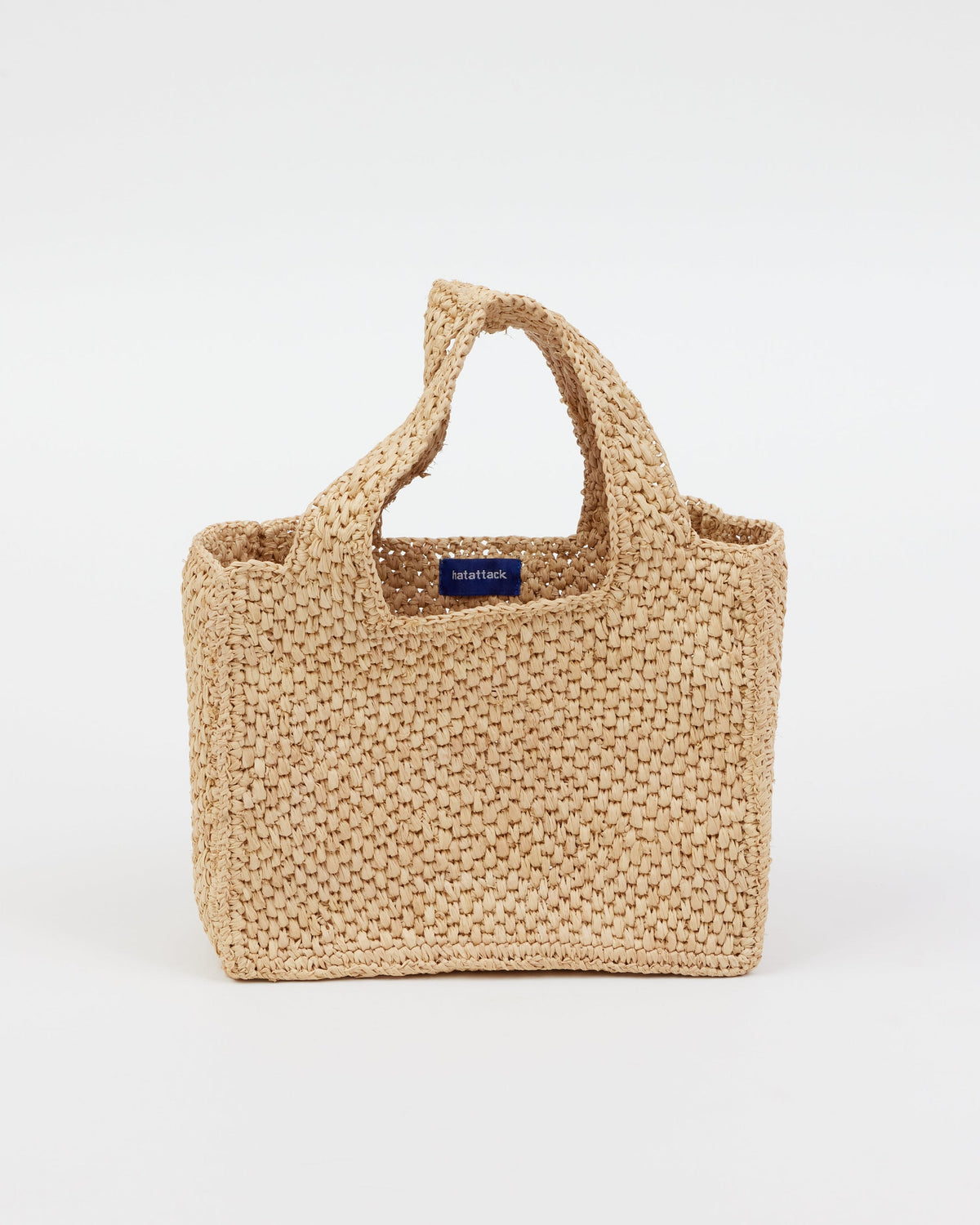 Small structured natural woven straw bag