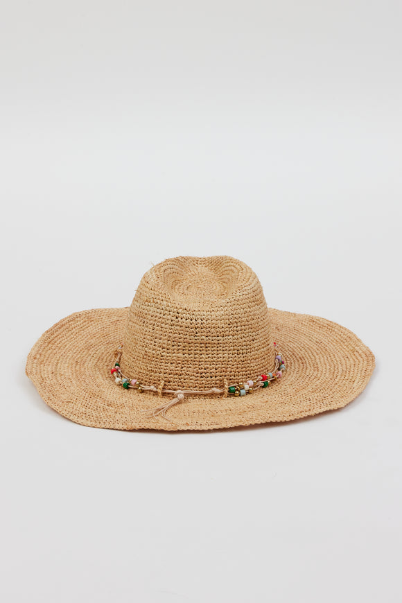 Back of tan straw woven sunhat with multi colored beaded trim