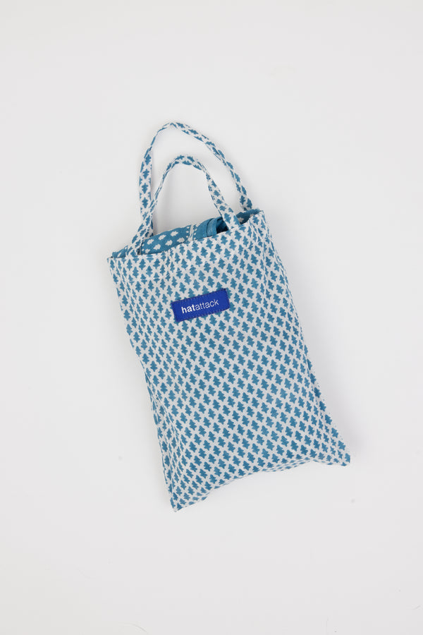 Blue and white sarong bag