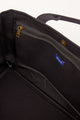 Inside of black tote with pockets