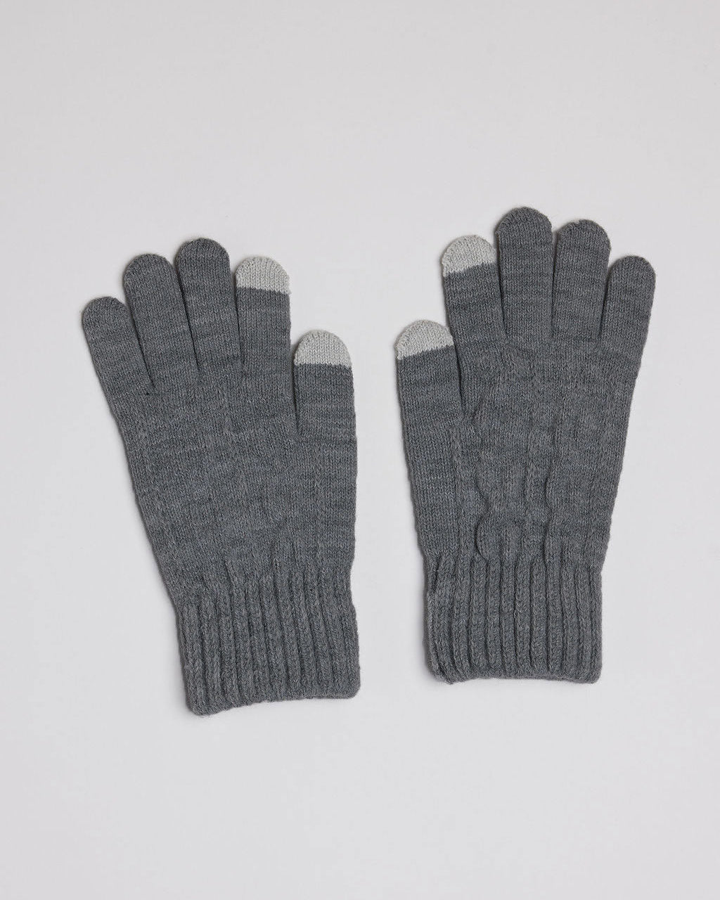Pair of gray gloves with touchscreen tips on a light gray background