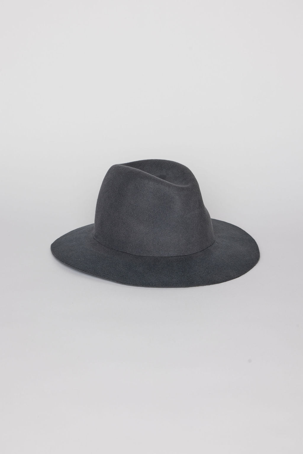 Dark gray fedora hat on a light gray background