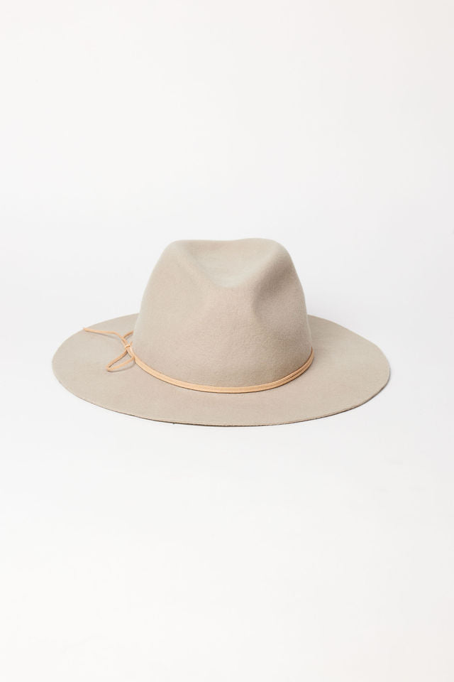 Beige felt hat with a gold band on a white background