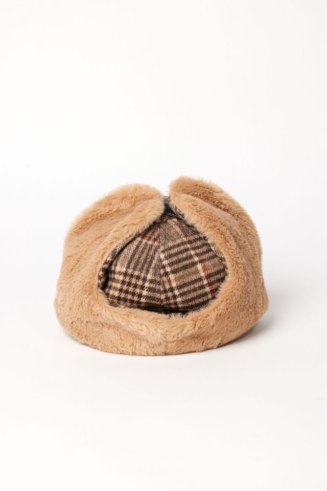 Back of brown plaid cap with earflaps