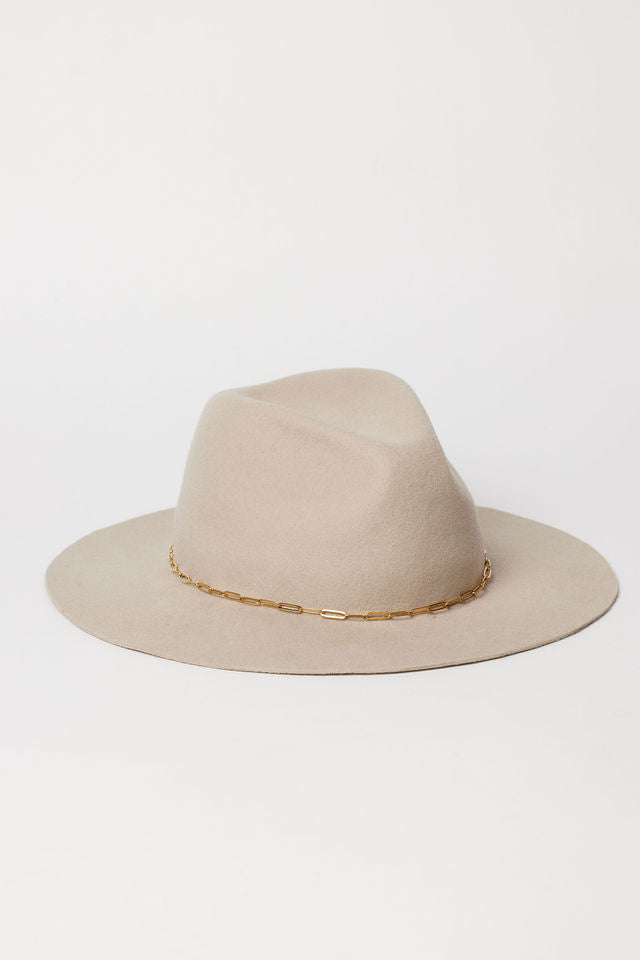 Beige hat with a gold chain band on a white background