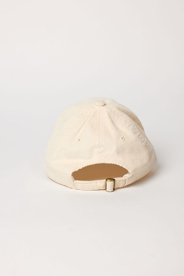 Back of ivory corduroy baseball cap