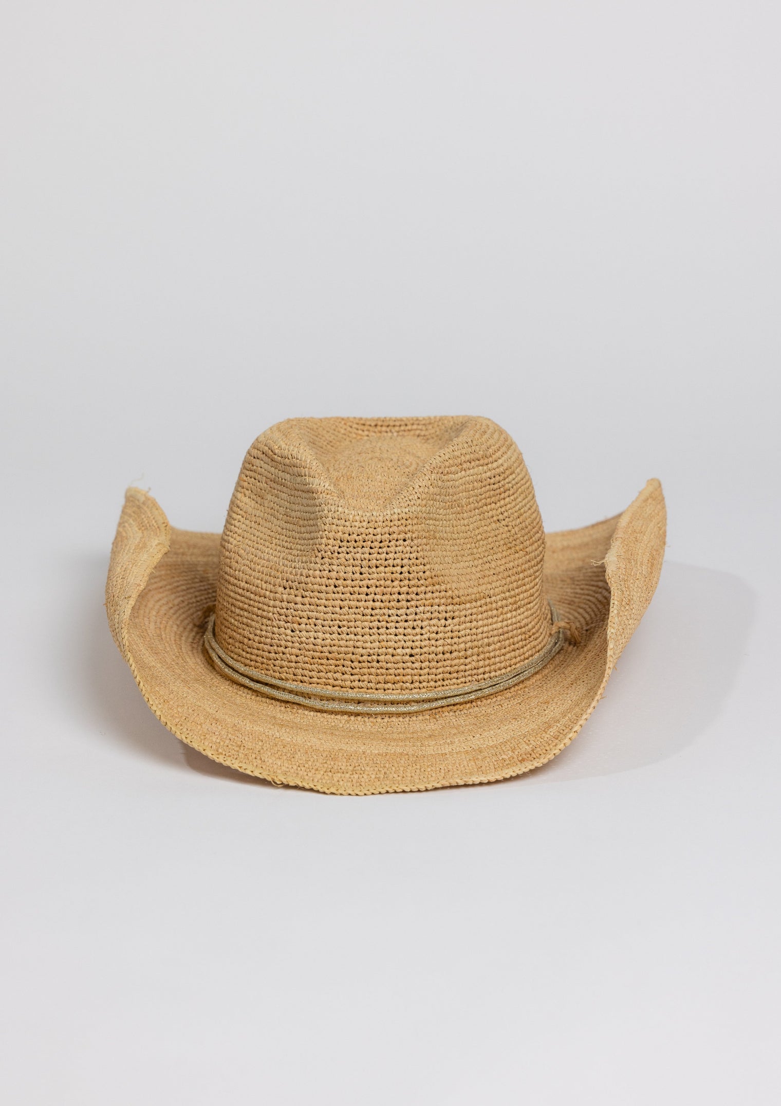 Front of raffia straw cowboy hat with metallic gold wrap detail
