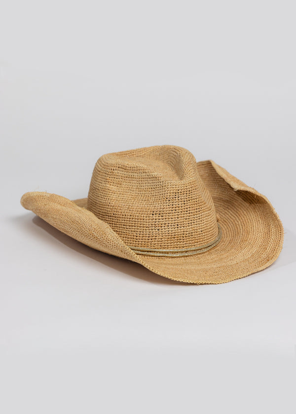 3/4 angle of raffia straw cowboy hat with metallic gold wrap detail