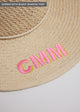 Close up of surfer style sun hat with embroidered letters