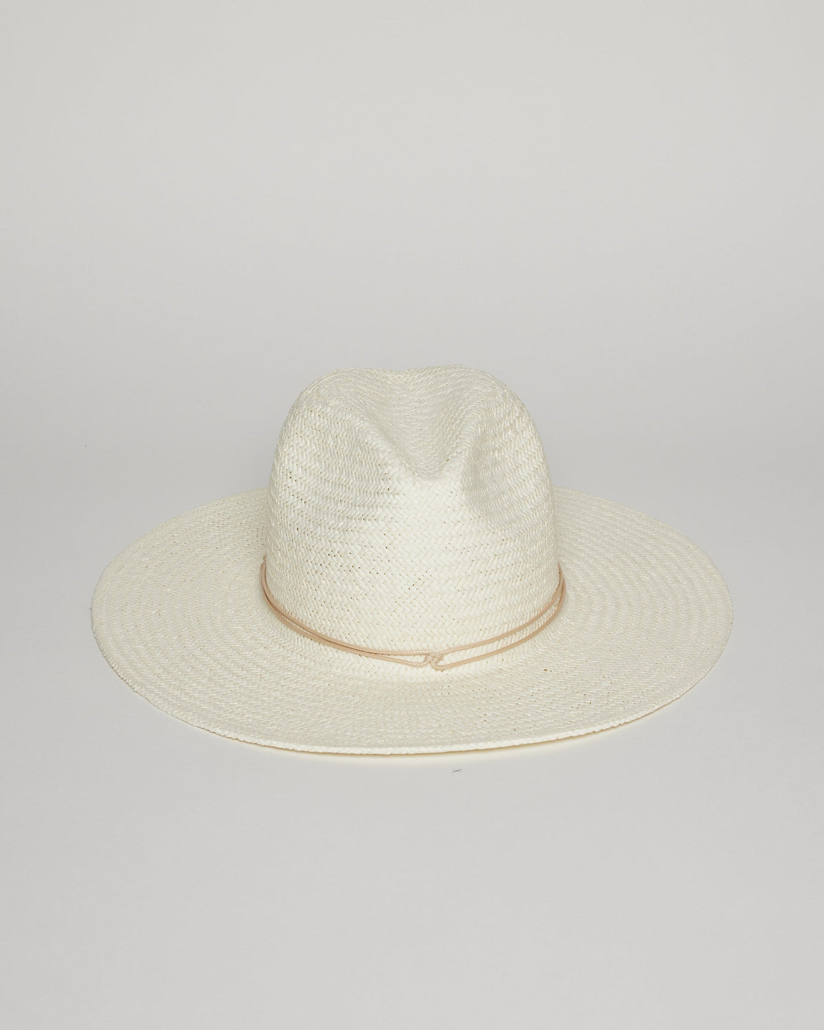 Front of white sun hat with tan tie detail