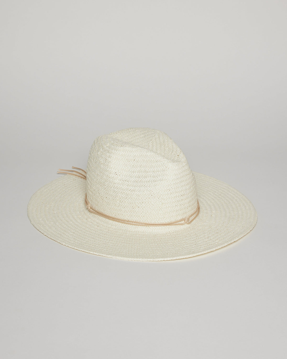 White brimmed sun hat with tan tie detail at crown