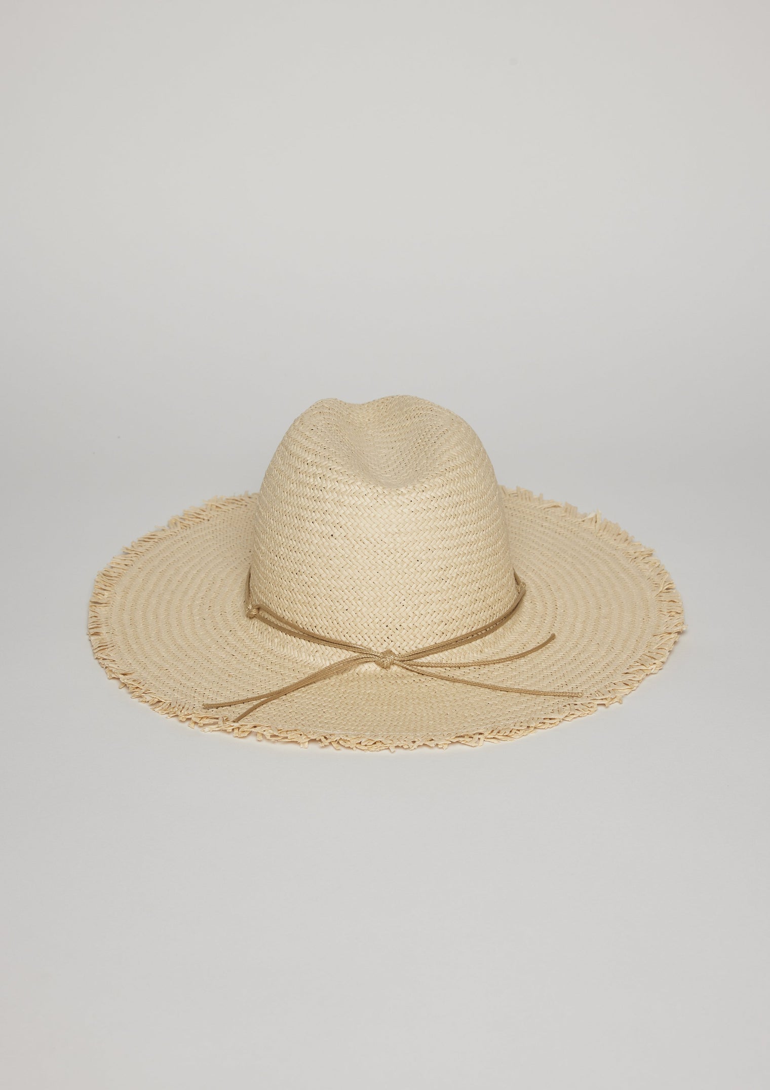 Back of fringed sun hat with trim