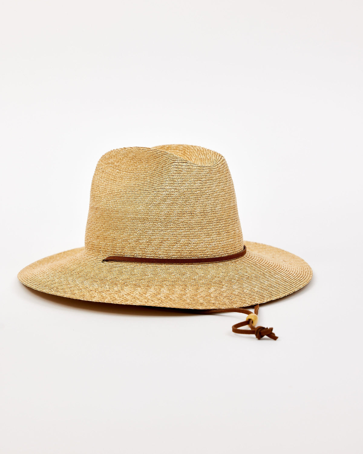 Beige straw hat with a wide brim and chinstrap on a white background