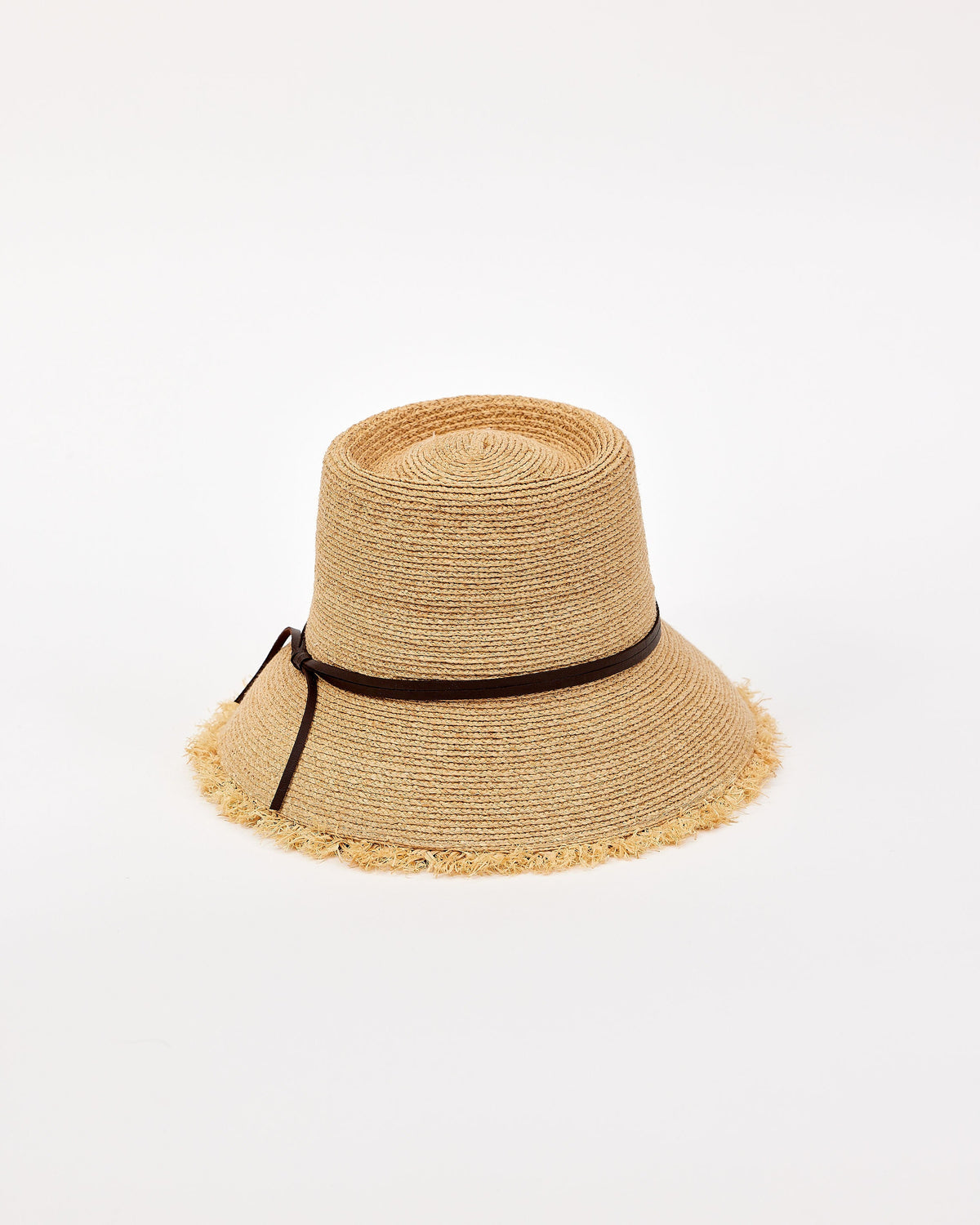 Beige straw bucket hat with a black band on a white background