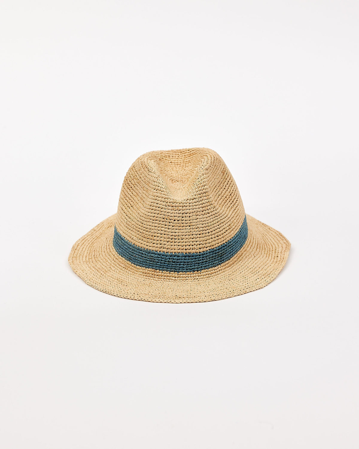 Straw hat with a blue band on a light beige background