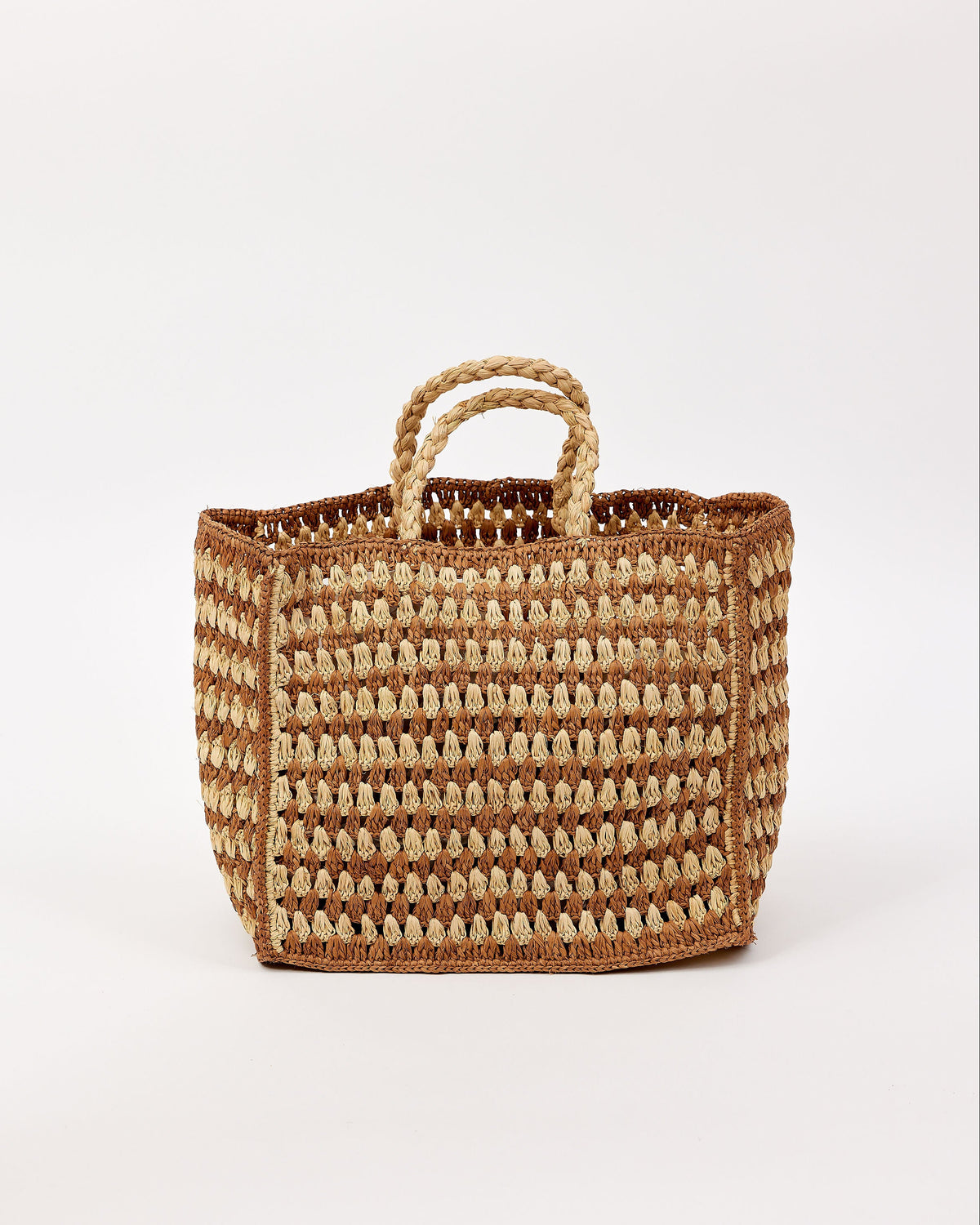 Two toned woven bag with handles on a white background