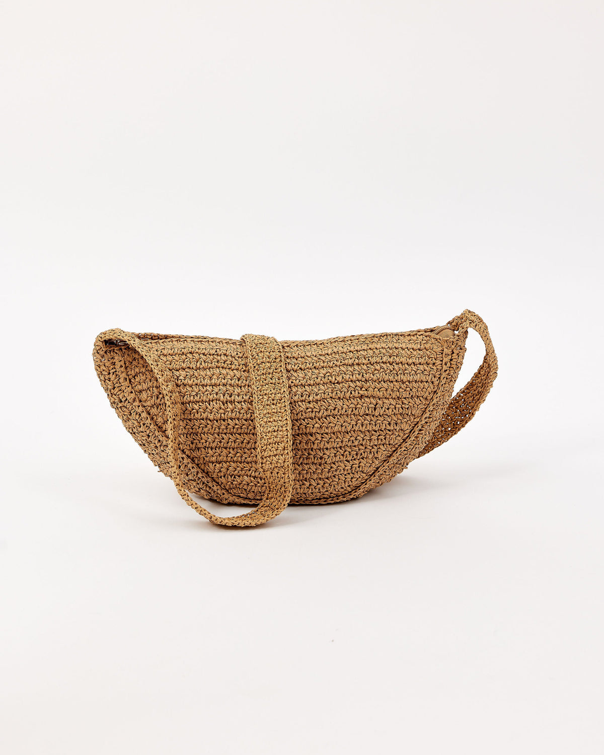 Woven crossbody handbag on a white background