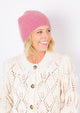 Cashmere Chunky Beanie in mauve on model wearing ivory sweater