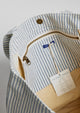 Inside of blue and white striped tote bag