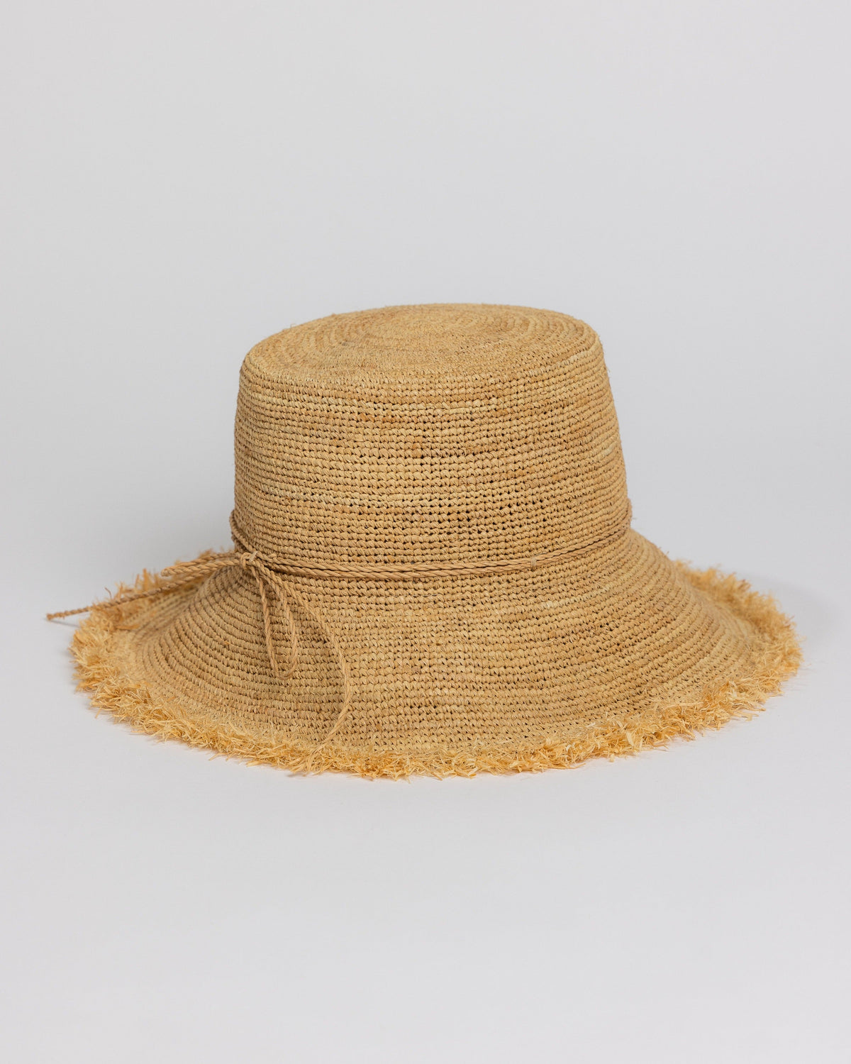 Natural colored Packable Raffia Bucket Hat with fringe trim and tie detail at band