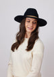 Black wool felt brimmed hat on model
