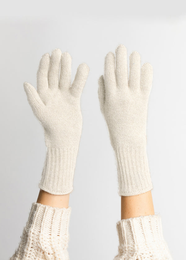Ivory cashmere gloves on model