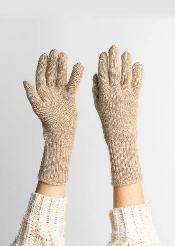 Taupe cashmere gloves on model