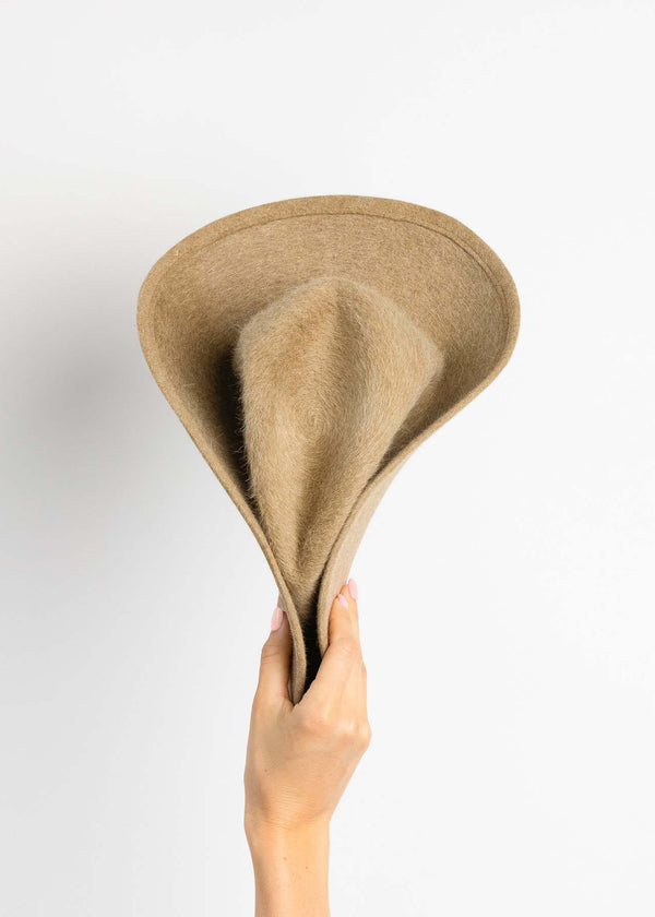 Folded tan velour brimmed hat