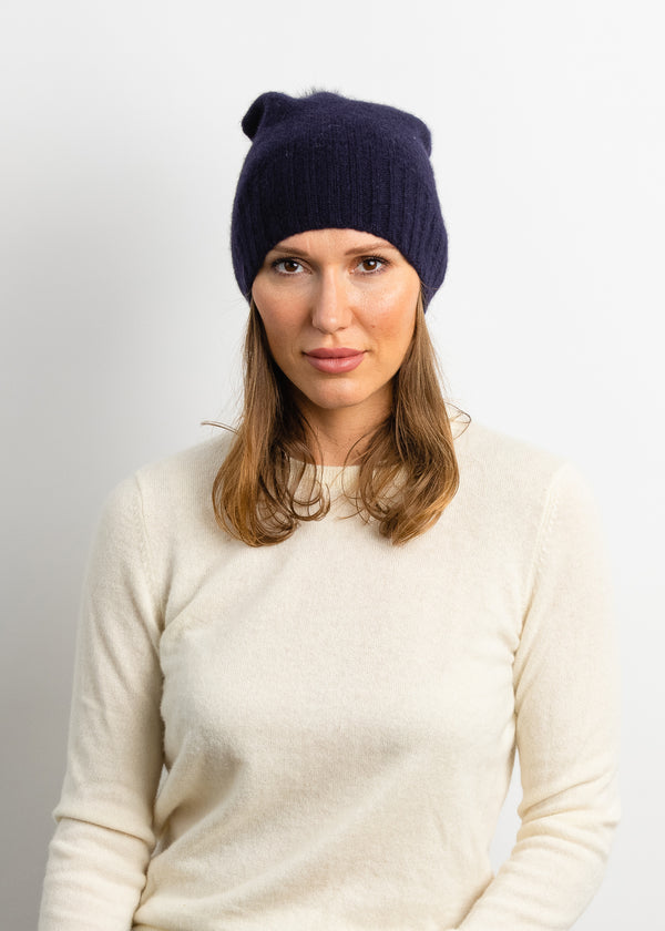 Navy cashmere slouchy beanie on model