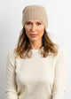 Taupe cashmere slouchy cuff beanie on model